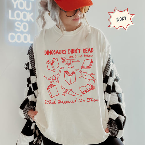 Funny book lover shirt mockup with dinosaur artwork and the phrase Dinosaurs Didn’t Read and We Know What Happened to Them.